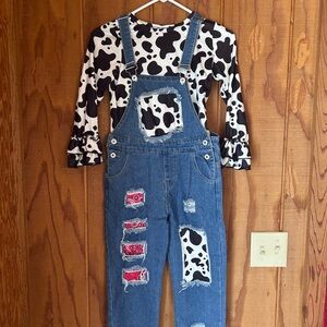 Cow Print Top and Distressed Denim Overalls